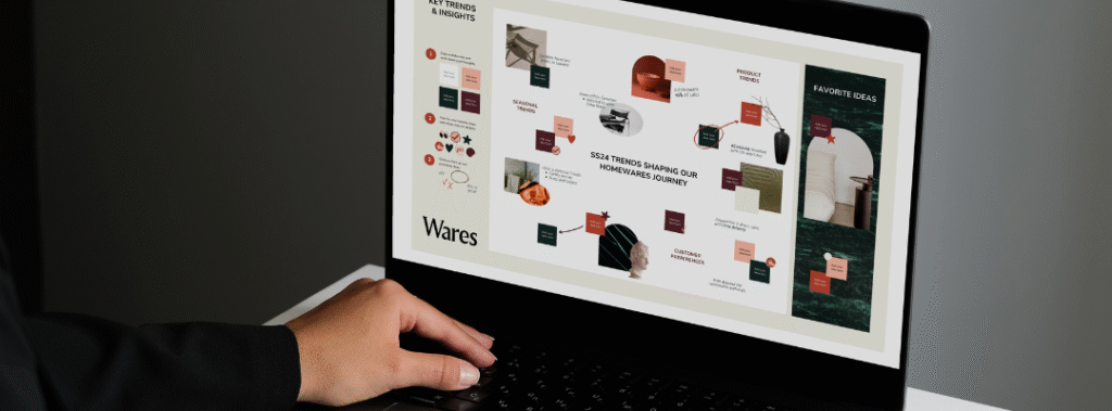 A designer’s desk with a laptop open to a branding project, symbolizing the process of rebranding a business.
