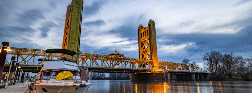 Tower Bridge in Sacramento at sunset, symbolizing local connection and Sacramento-based design support for small businesses