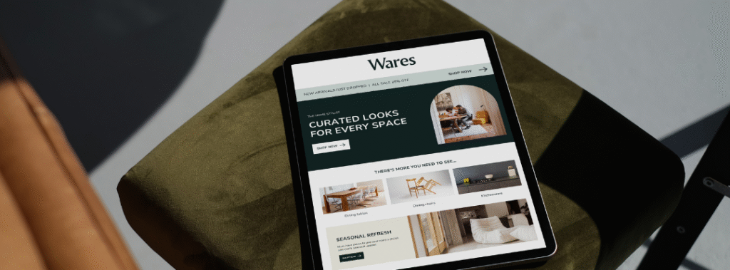 Tablet displaying a modern ecommerce homepage on a chair, a visual cue that it is time to rebrand.