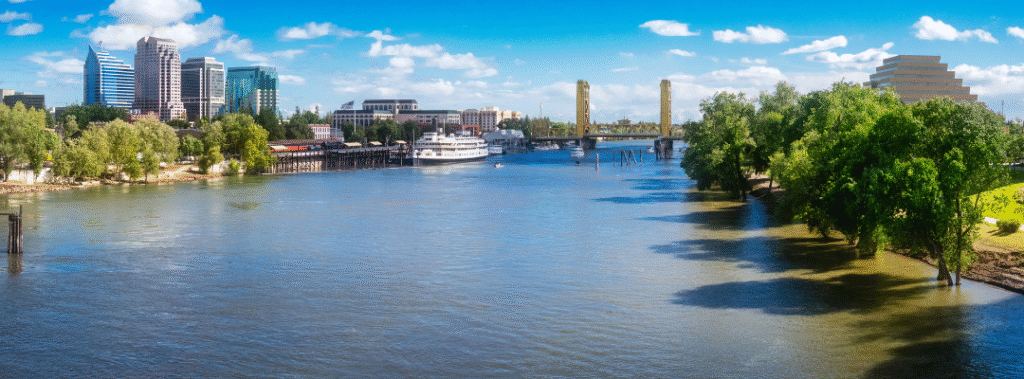 Sacramento riverfront, illustrating how local businesses can move beyond one-off projects with scalable Sacramento graphic design systems that drive consistency, efficiency, and growth