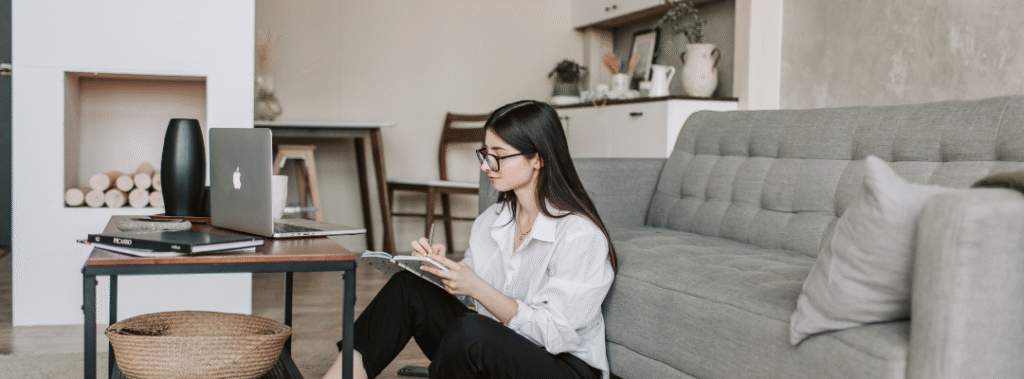 A business owner working on their How to Set SMART Marketing Goals for 2026.